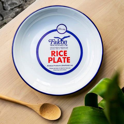 photo shows white enamel rice plate with blue rim