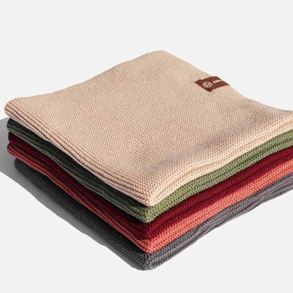 Stack of organic dish cloths in various colours