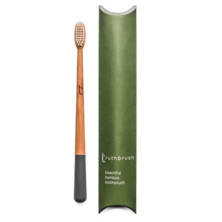 Photo shows a bamboo toothbrush in storm grey colour