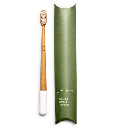 Photo shows a bamboo toothbrush in cloud white colour